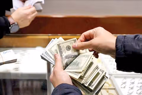 Iran’s rial sinks to record low as dollar hits 2 million