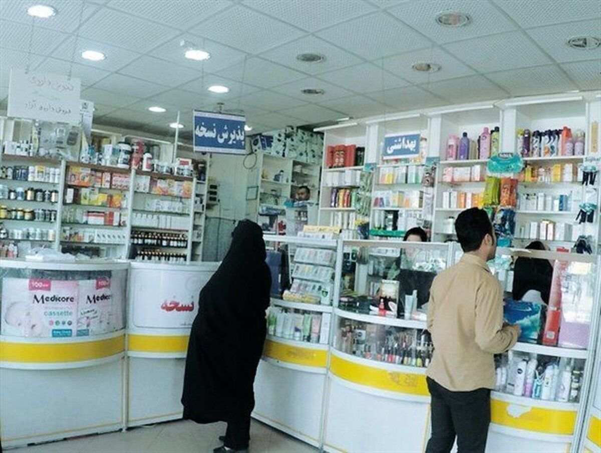Customers wait inside a pharmacy in Iran amid rising medicine prices and shortages of some drugs across the country.