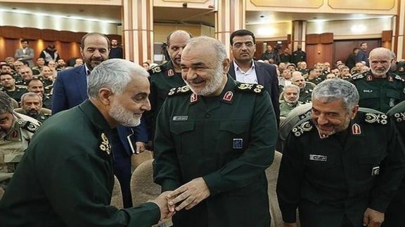 An undated photo showing IRGC top brass at an event, with Qasem Soleimani (L) who was killed by a US drone strike in 2020