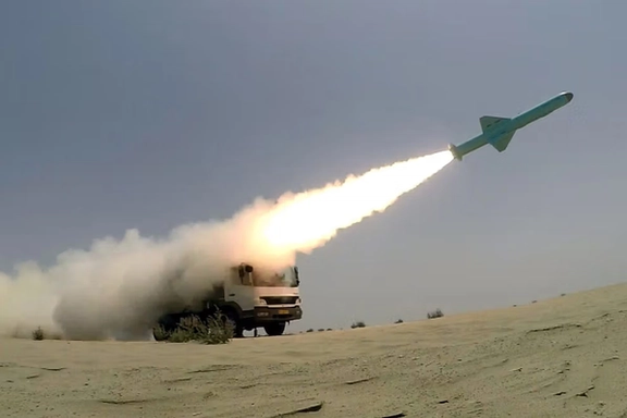 A missile is launched from a mobile launcher in an Iranian military drill