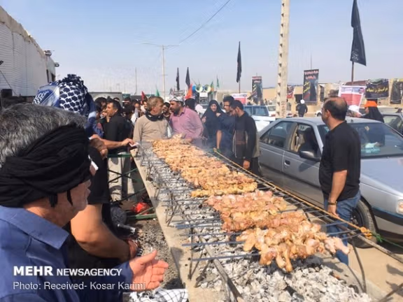 Free food is served to pilgrims of Arbaeen along the route to the Iraqi city of Karbala (file photo)