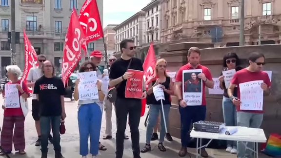 Activists staging a protest in Milan, Italy to condemn the death sentence of Sharifeh Mohammadi