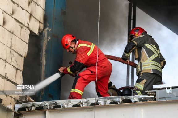 Firefighters trying to extinguish a fire at a cosmetics factory in Karaj, Iran, January 9, 2024