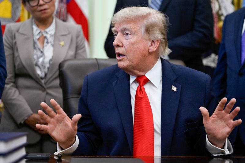Iran hardliners rally against emerging US deal on eve of signing ceremony