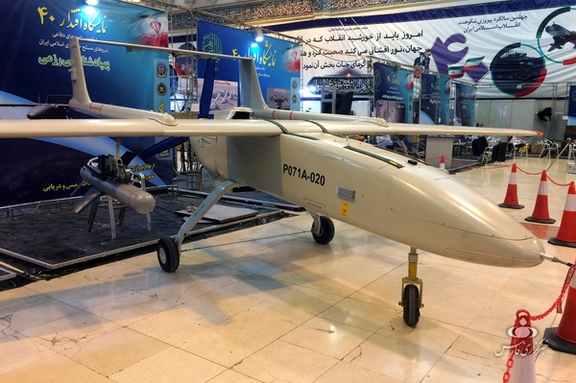 A Mohajer-6 Iranian drone shown with Qassem missiles
