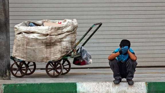 A waste picker in Iran