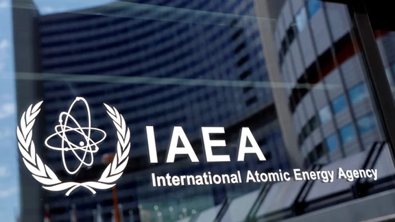 The logo of the International Atomic Energy Agency (IAEA) is seen at their headquarters during a board of governors meeting in Vienna, Austria.