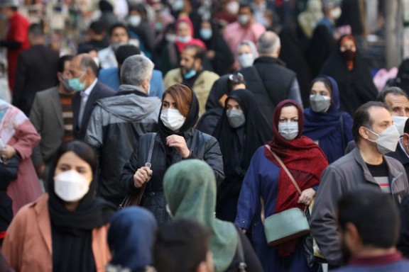 People walking in a Tehran street on November 29, 2021