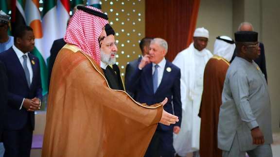 Saudi Crown Prince Mohammed bin Salman welcomes Iranian President Ebrahim Raisi during the Islamic summit in Riyadh, Saudi Arabia, November 11, 2023.