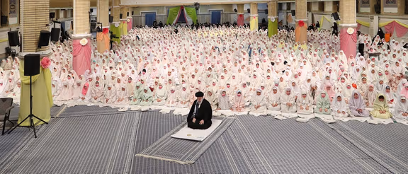 Iran’s ruler Ali Khamenei during a meeting with a group of schoolgirls (February 2023)