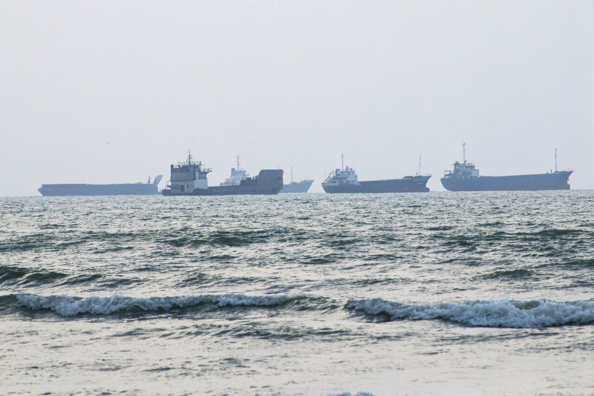 Commercial vessels in the Strait of Hormuz amid heightened tensions between Iran and the United States.