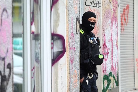 A German police officer during a raid against people supporting the Palestinian Islamist group Hamas, in Berlin, November 23, 2023.