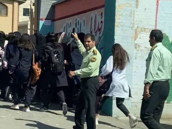 Police sent to a girls' school as students rebel. All students have taken off their headscarves. October 4, 2022