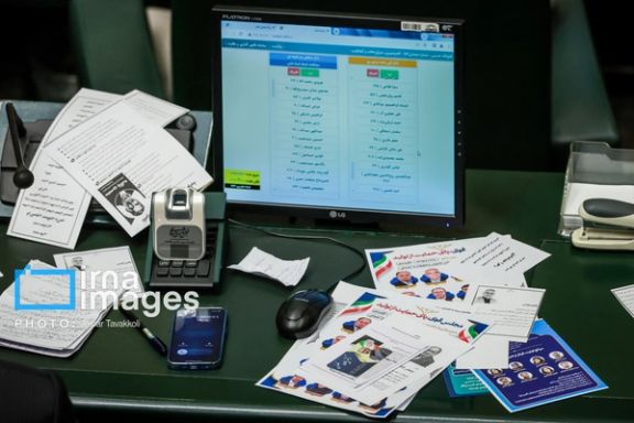 The desk of the a lawmaker at the Iranian parliament