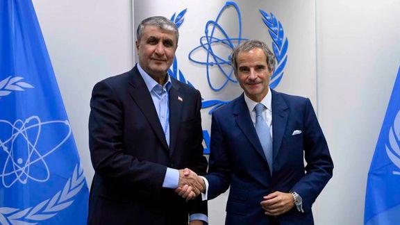 Head of the Atomic Energy Organization of Iran Mohammad Eslami (left) and the International Atomic Energy Agency Director General Rafael Mariano Grossi in Vienna on September 25, 2023