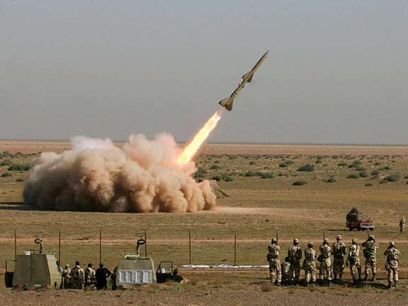 An Iranian Tondar missile is launched during a test at an unknown location in central Iran, September 2009