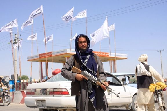 A Taliban fighter looks on as he stands at the city of Ghazni, Afghanistan August 14, 2021.