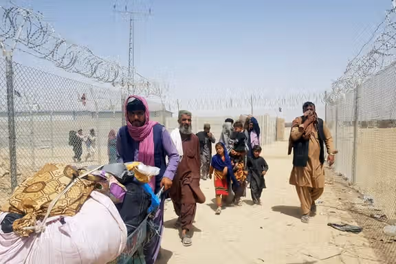 Afghan migrants at the border with Iran (file photo)
