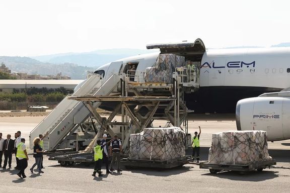 Workers unload medical supplies delivered by the World Health Organization for any potential health crisis resulting from hostilities, in Beirut, Lebanon, August 5, 2024.