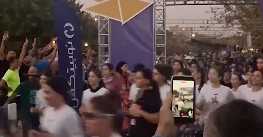 Unveiled runners draw attention at Tehran 10k race
