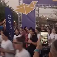 Unveiled runners draw attention at Tehran 10k race