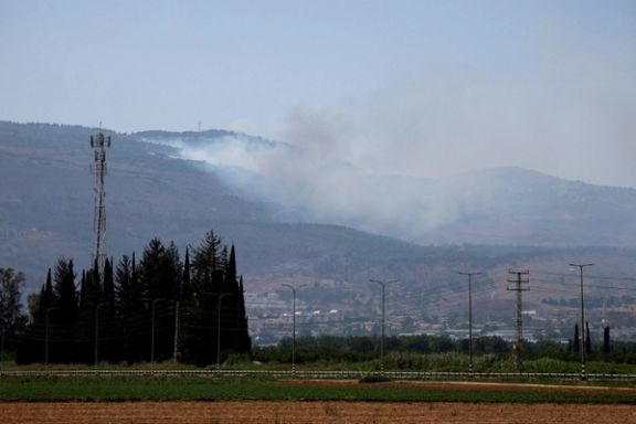 Smoke rises, amid ongoing cross-border hostilities between Hezbollah and Israeli forces, in Kiryat Shmona, northern Israel, June 14, 2024.