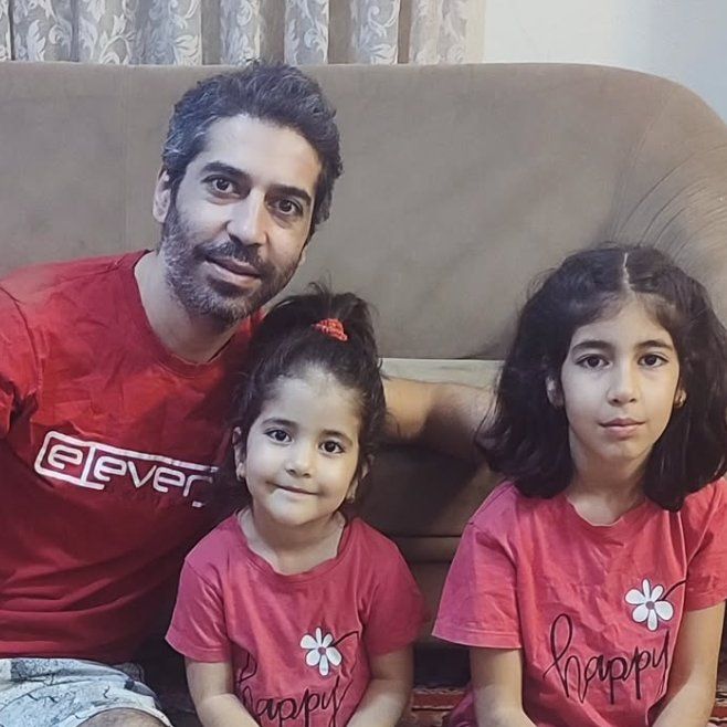 Protester Vahid Mohammadlou, who was shot dead in the eye on January 8 in Tehran, seen here with his children.