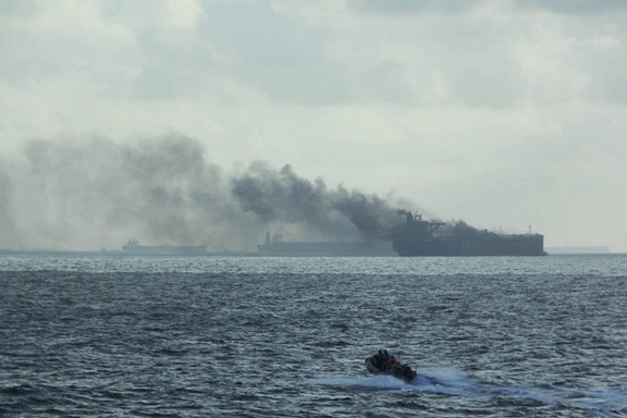 Burning vessels following a fire on two oil tankers about 55 km (34 miles) northeast of the Singaporean island of Pedra Branca, July 19, 2024.