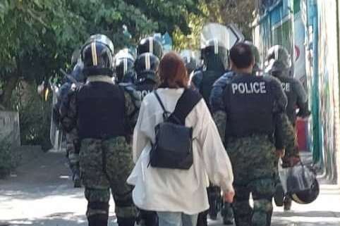 An Iranian woman defying mandatory hijab in Tehran