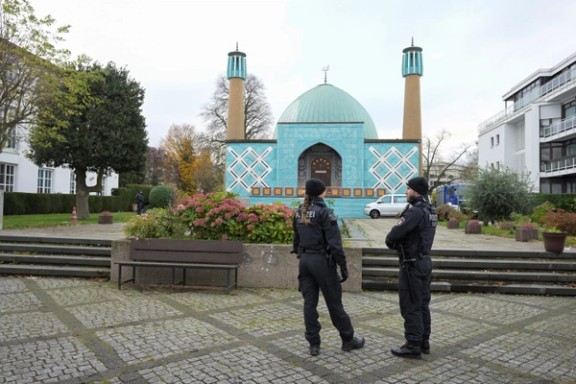 German police stand outside during an Islamic Center Hamburg raid, due to suspicion of members acting against a constitutional order and supporting the militant group Hezbollah in Hamburg, Germany, November 16, 2023.