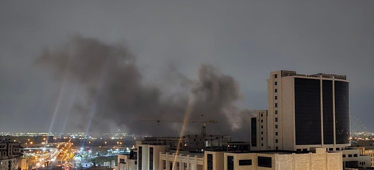 Smoke billows over western Tehran skyline after reported strikes, March 30, 2026