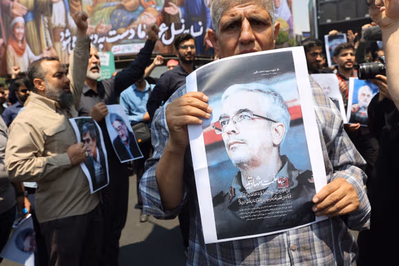 People attend an anti-Israeli protest following the Israeli strikes on Iran, in Tehran, Iran, June 13, 2025.