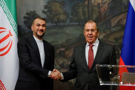 Russian Foreign Minister Sergei Lavrov shakes hands with Iranian Foreign Minister Hossein Amir-Abdollahian during a news conference following their meeting in Moscow, Russia March 29, 2023.