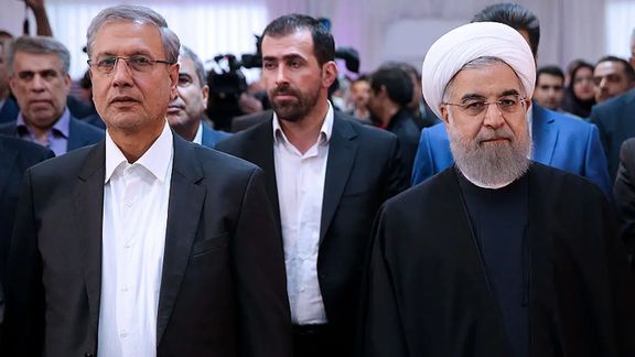 Iranian politician and former Labor Minister Ali Rabiei (left) and former president Hassan Rouhani