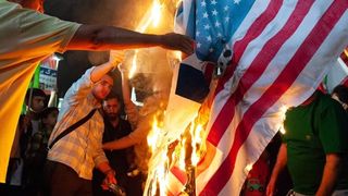 Tehran moderates urge US talks to avert collapse, hardliners cry betrayal