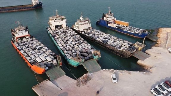 Ships unloading foreign cars in southern Iran