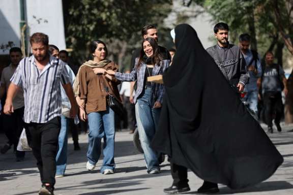 Iranian people walk at the Tehran Bazaar in Tehran, Iran, September 27, 2025.