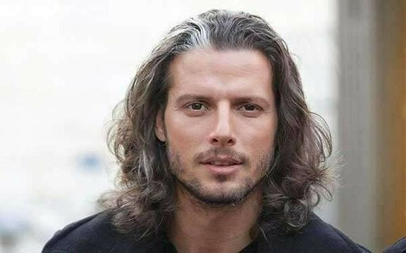 Tehran Police Warn Long-Haired Male Football Coach Over His Hijab