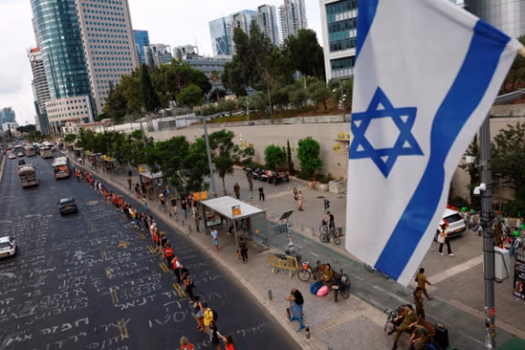 Israelis gather to commemorate the one year since the deadly October 7 attack, in Tel Aviv, October 7, 2024.