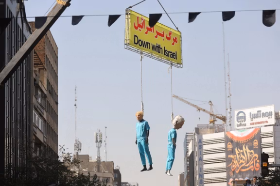Effigies of US President Donald Trump and Israeli Prime Minister Benjamin Netanyahu being hanged are displayed during the 46th anniversary of the US expulsion from Iran, in Tehran, November 4, 2025.