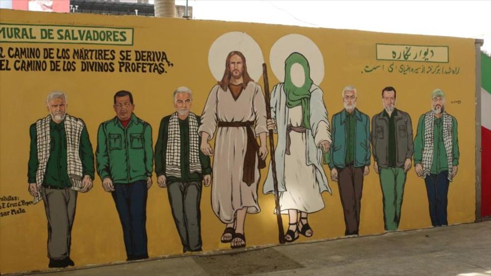 A Spanish and Persian mural showing Jesus and a Shia imam with Qasem Soleimani, other militant leaders and Venezuela's Chavez.