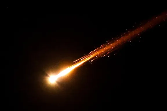 A missile launched from Iran towards Israel is seen from Ramallah, Israeli-occupied West Bank, June 18, 2025.