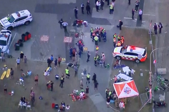 An aerial view of emergency personnel working at the scene of a shooting incident at Bondi Beach in Sydney, Australia, December 14, 2025, in this screen grab from a video. (credit: NINE NETWORK/SEVEN NETWORK/AUSTRALIAN BROADCASTING CORPORATION/Handout via REUTERS)