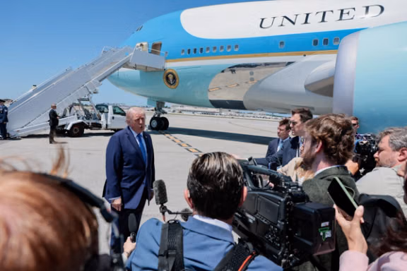 US President Donald Trump speaks to the media before departing Palm Beach International Airport en route to Joint Base Andrews, in West Palm Beach, Florida, April 25, 2026.