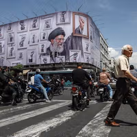 Hope and hostility collide in Tehran over possible deal with US