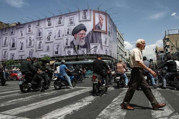 Hope and hostility collide in Tehran over possible deal with US