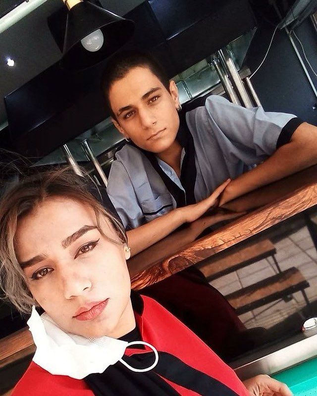 An undated photo of Mahsa Shafiee alongside her younger brother Parsa Shafiee who was killed during Iran's Woman Life Freedom protests in 2022.