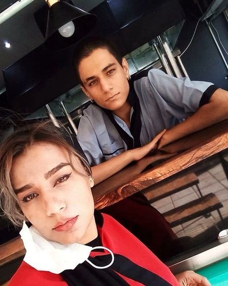 An undated photo of Mahsa Shafiee alongside her younger brother Parsa Shafiee who was killed during Iran's Woman Life Freedom protests in 2022.