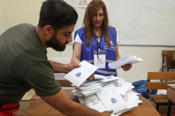 Electoral workers counting ballots after parliamentary polls in Lebanon on Sunday