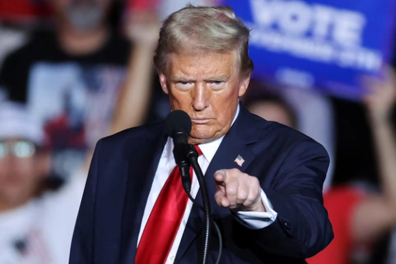 Republican presidential nominee and former U.S. President Donald Trump gestures during a rally, in Henderson, Nevada, US October 31, 2024.